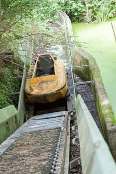 Boat of a waterway at the lower end of a conveyor line