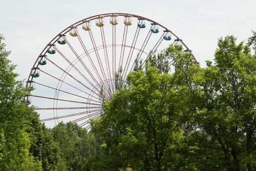 Abandoned Ferris wheel in the former amusement park