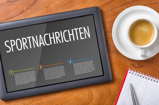 Tablet on a desk - Sports news