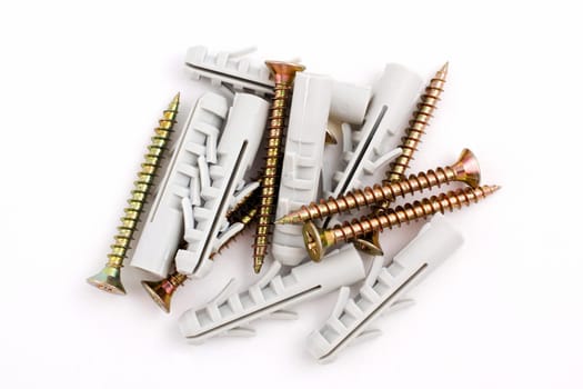 dowels and screws on a white background