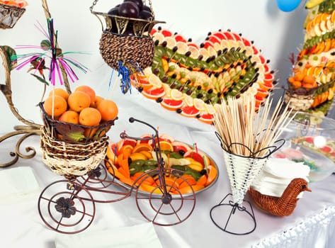 fruit buffet with fruit  heart and fruit pyramid heart
