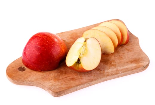 apple cut on a board on a white background