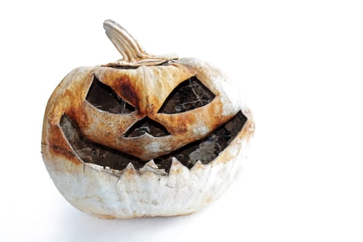An old creepy pumpkin. A creepy pumpkin head for Halloween