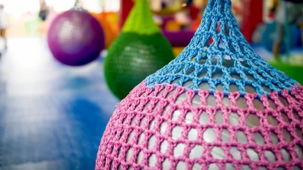 Closeup image of colorful fitness ball in yoga studio or gym.