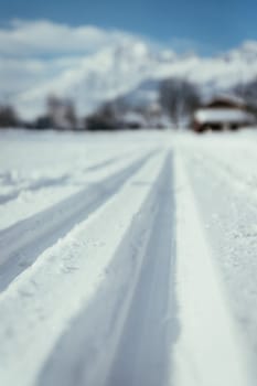 Cross-country skiing slope in Austria, beautiful mountain scenery, blurry background