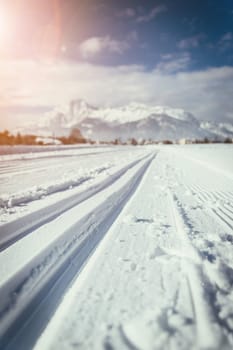 Cross-country skiing slope in Austria, beautiful mountain scenery, blurry background