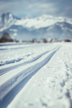 Cross-country skiing slope in Austria, beautiful mountain scenery, blurry background