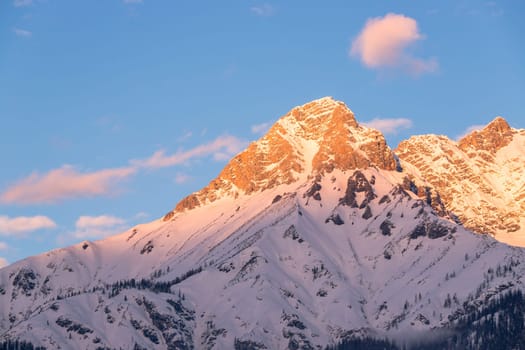 Idyllic scenery with snowy mountains in the evening sun, Alps, Austria