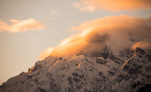 Idyllic scenery with snowy mountains in the evening sun, Alps, Austria