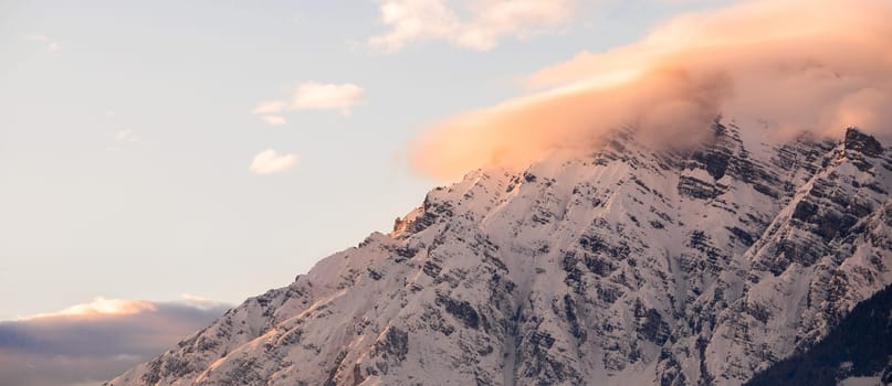 Idyllic scenery with snowy mountains in the evening sun, Alps, Austria