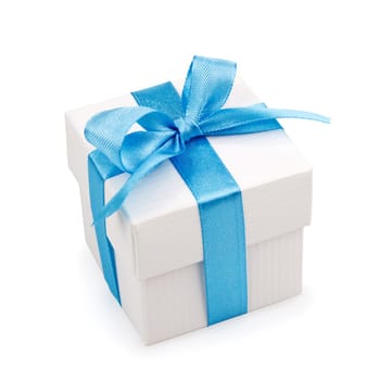white gift box with blue ribbon and bow isolated on white