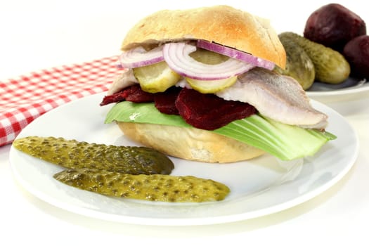 Matjes rolls with beetroot,onions and sour cucumber