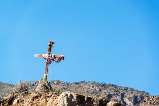 Small cross on the edge of Colca Canyon near Arequipa, Peru