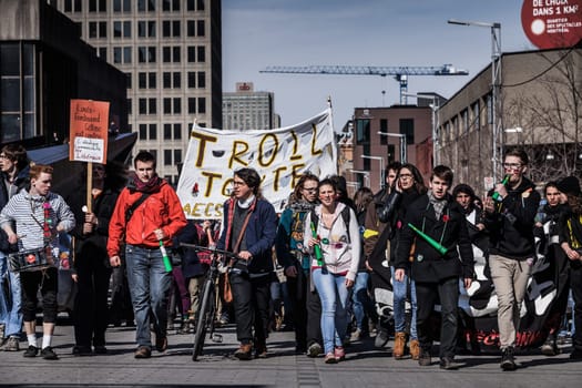 MONTREAL, CANADA, APRIL 02 2015. Riot in the Montreal Streets to counter the Economic Austerity Measures. View of the First line of Protesters walking in the Street