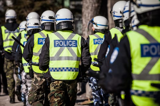 MONTREAL, CANADA, APRIL 02 2015. Riot in the Montreal Streets to counter the Economic Austerity Measures. Closeup of Police Gear and Protections
