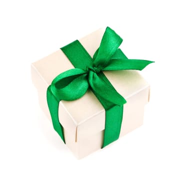 white gift box with green ribbon and bow isolated on white top view