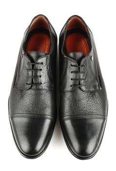 Classic black leather mens shoes with laces isolated on white background top view