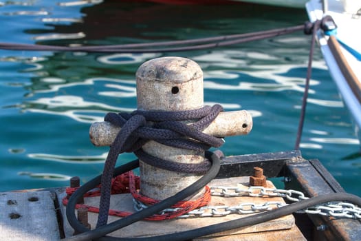 Bollard at dock in the see