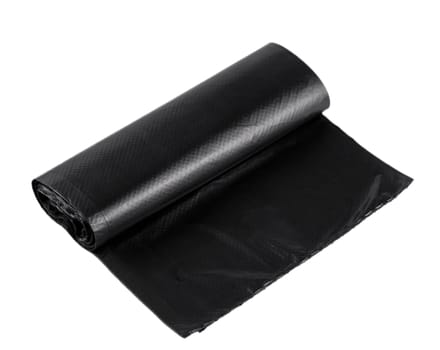 Black plastic polyethylene trash bag roll isolated over the white background