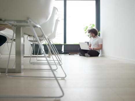 Real man Using laptop on the floor At Home  Enjoying Relaxing