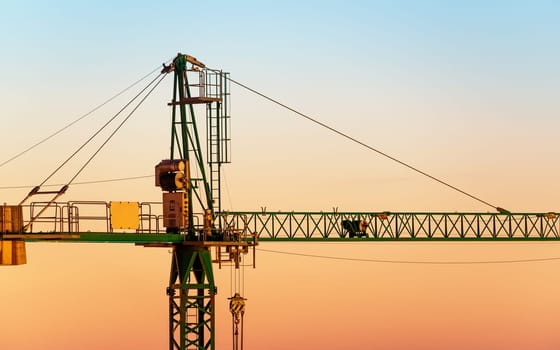 Tower crane detail shot at sunset