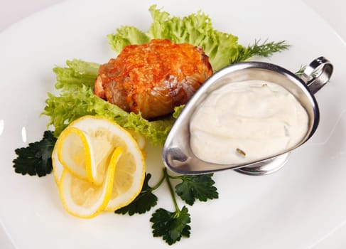 meat sauce with lemon and salad isolated on white