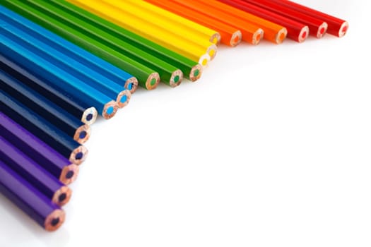 colored pencils on a white background with space for text