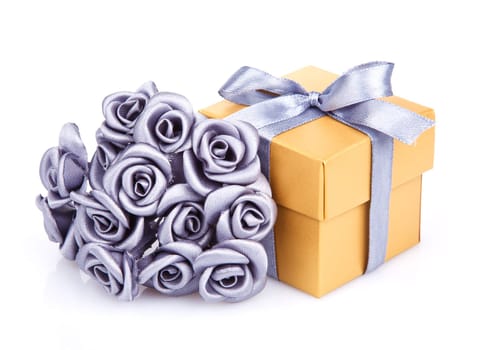 gray flowers and yellow gift box with gray ribbon on white background