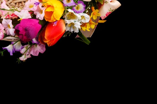 artifical flowers on a black background
