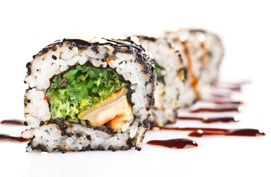 Traditional japanese sushi  with sauce isolated on white background