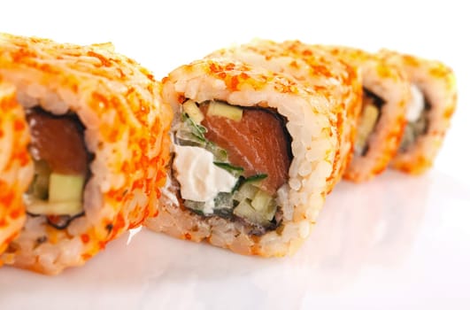 traditional fresh japanese sushi rolls on a white background