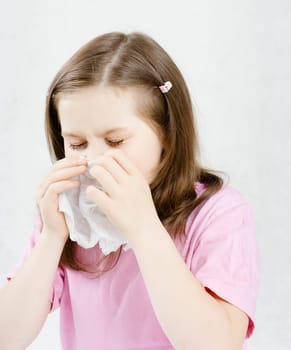Girl with a white handkerchief. childhood disease