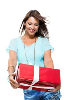 Happy attractive young woman with red gift with white bow Cheerfully isolated against white background with text space