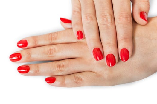 Women's hands with beautiful well-groomed fingers and red nail polish wellness beauty spa close up isolated on white background