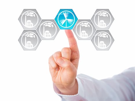 Blue wind energy icon selected by touch. The right index finger of a business person is choosing this renewable energy symbol in an interface with hexagonal smoking factory buttons. Cutout on white.