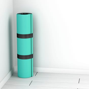 Rolled yoga mat in the room