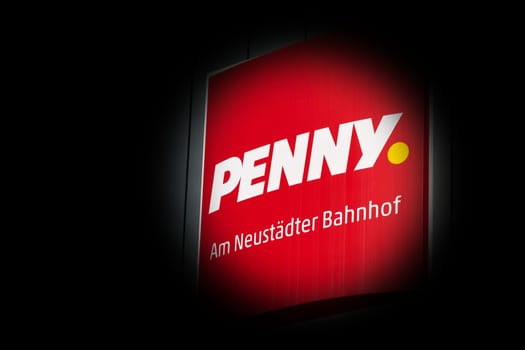Neon sign for a branch of the food discounter Penny in the city center of Magdeburg in Germany