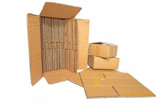Several cardboard boxes of different sizes isolated on white