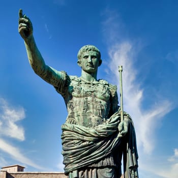 Italy, Rome. Statue in a public street of the roman emperor Gaius Julius Caesar. Concept for authority, domination, leadership and guidance.