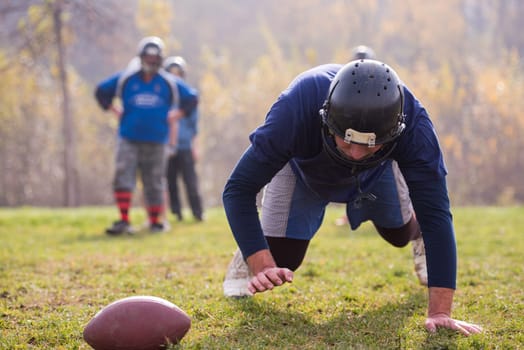 young american football player in action during the training at field