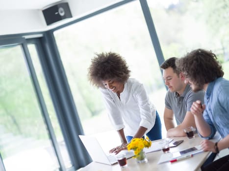 Multiethnic Group of business people discussing business plan  in the startup office