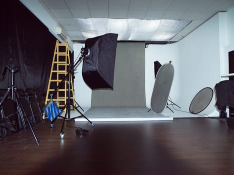 Modern photo studio interior with professional lighting equipment