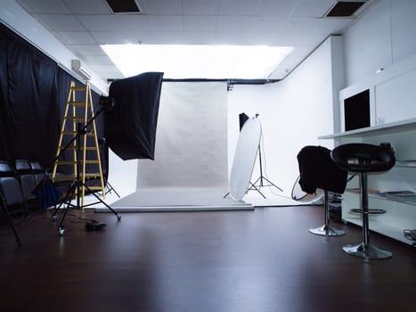 Modern photo studio interior with professional lighting equipment