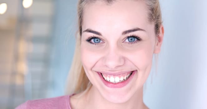close-up portrait of a beautiful young blond woman