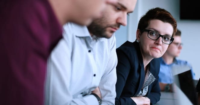 Group of business people discussing business plan  in the office