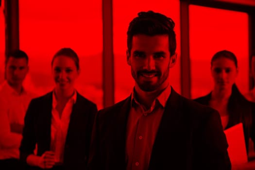 Group of happy young  business people in a meeting at office