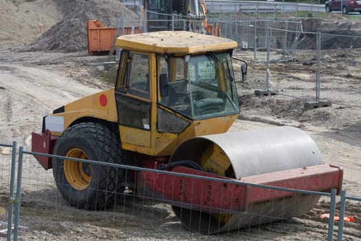 Steamroller, on a construction site during leveling work on a road