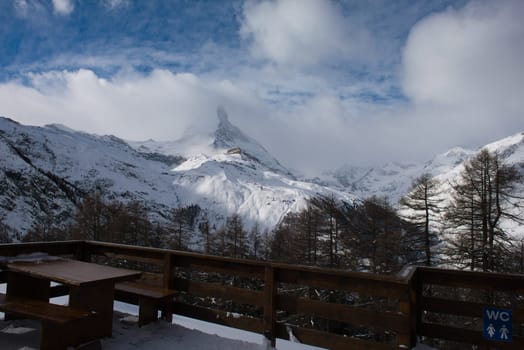 mountain matterhorn zermatt switzerland  with fresh snow on beautiful winter day