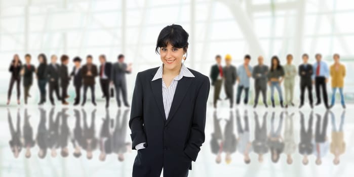 business woman in front of a group of people