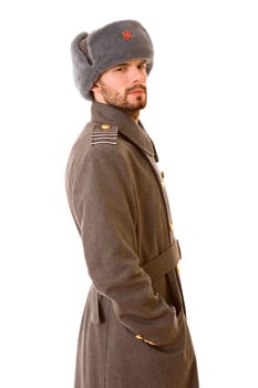 young man dressed as russian military, studio picture